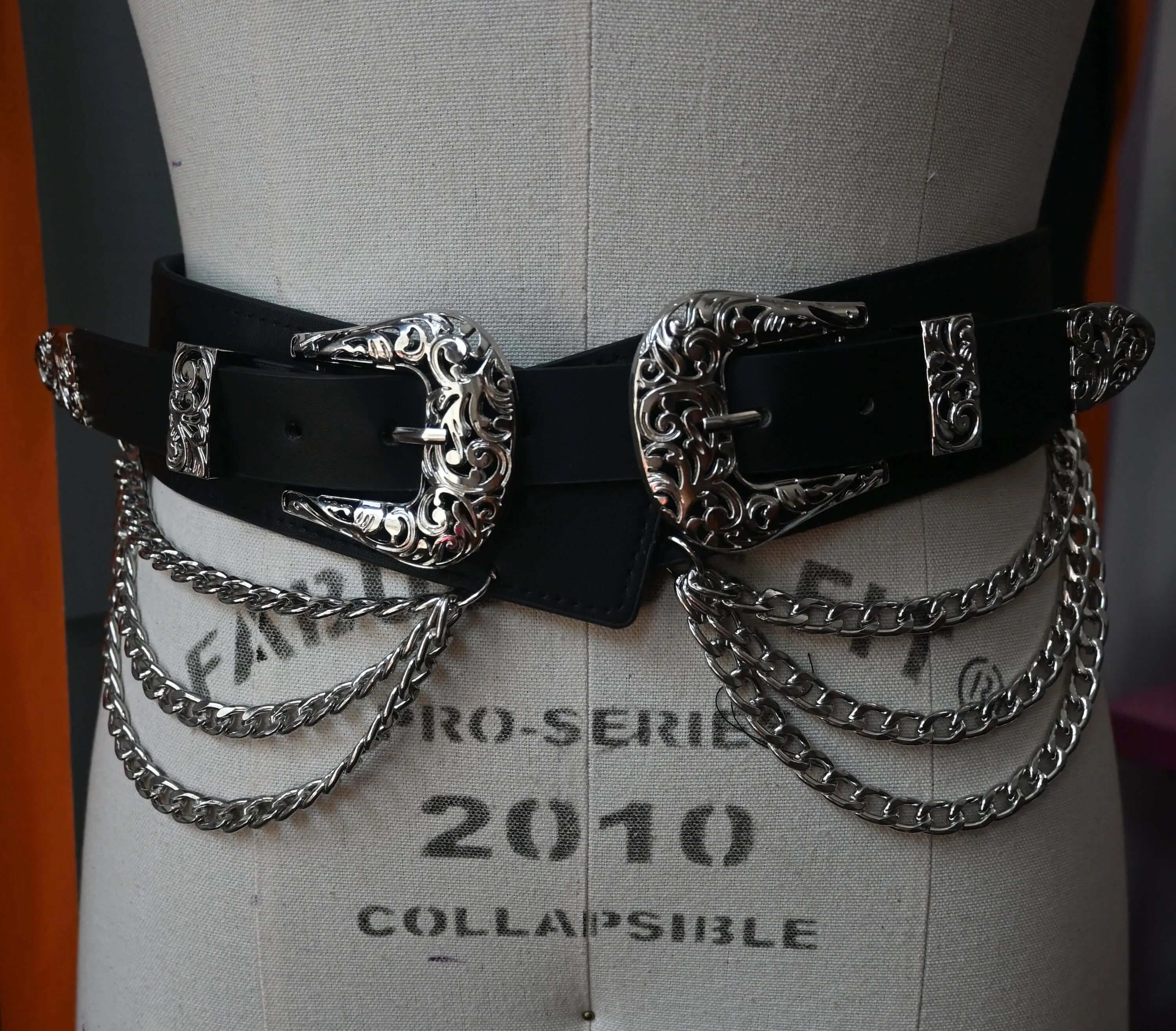 Western-style faux leather belt with triple chains