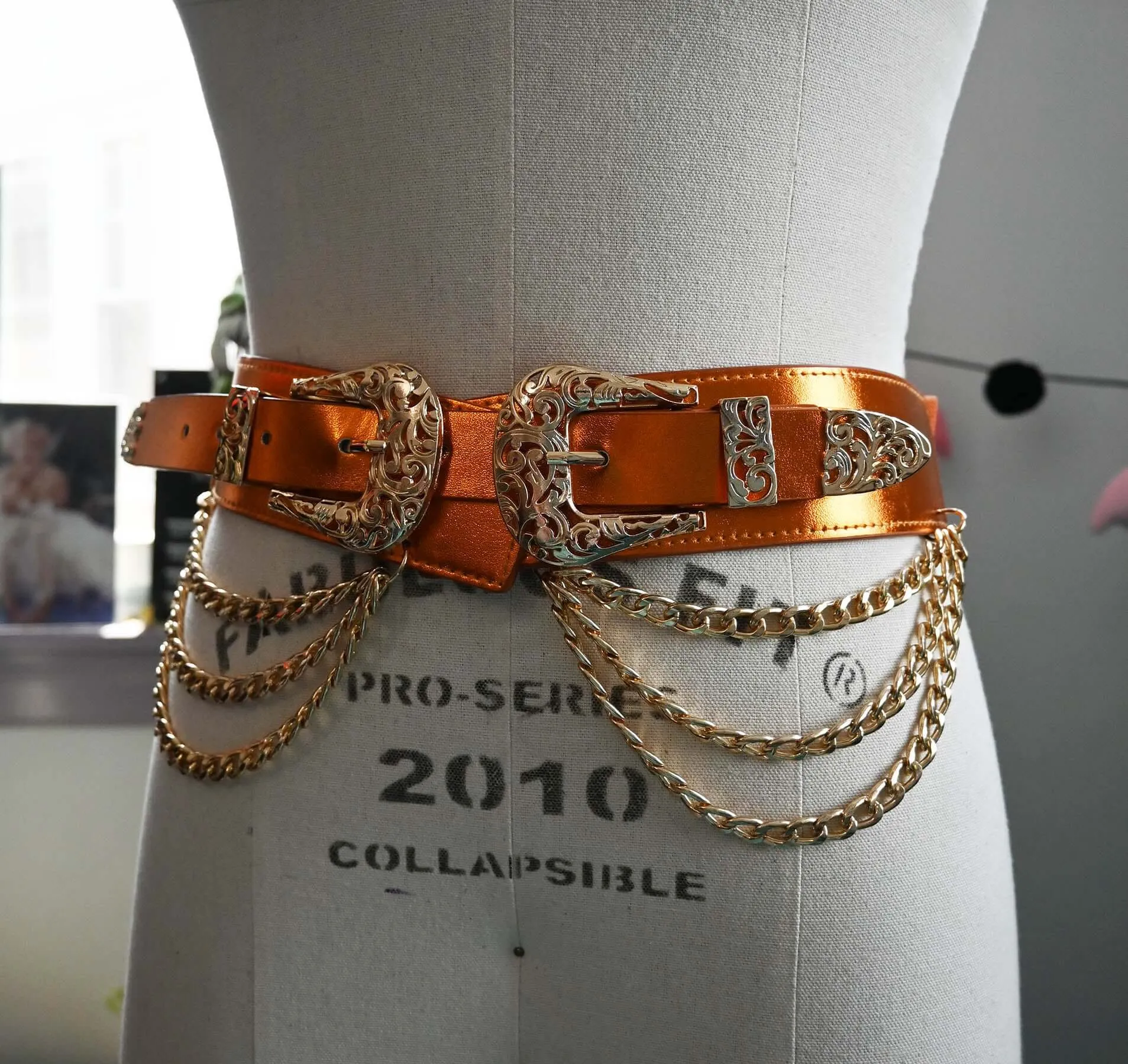 Western-style faux leather belt with triple chains